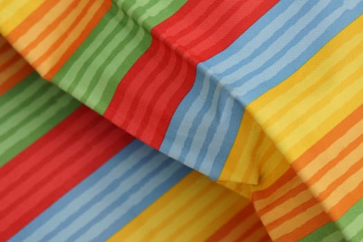 Abstract colorful background stripe textile texture. Macro photo.