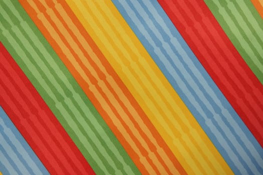 Abstract colorful background stripe textile texture. Macro photo.