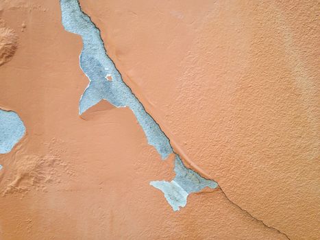 Deteriorated exterior paint of house wall