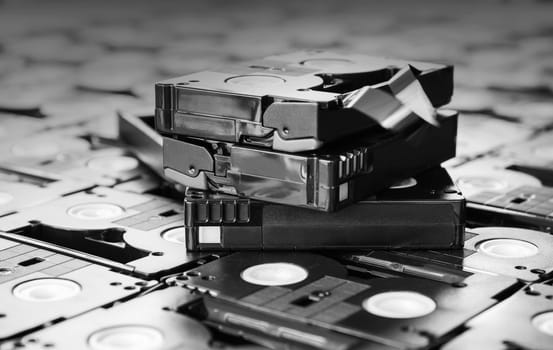 Black and white colour abandoned pile of old useless mini DV (video recording cassette tape)