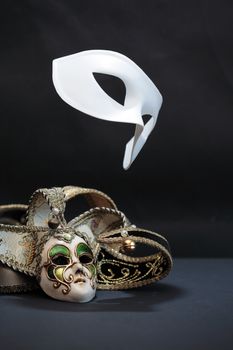 Theater concept. White classical carnival mask. Performance. Flight. Freedom