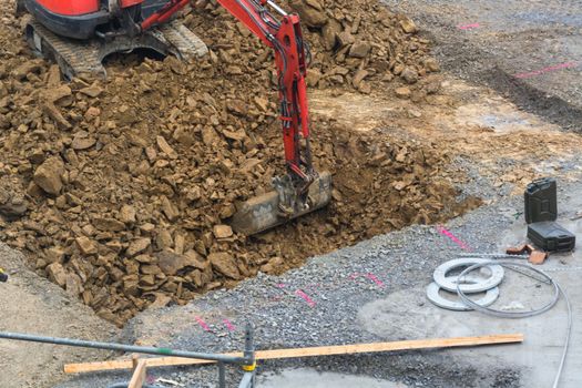 Mini excavator with excavation work for a new construction home.