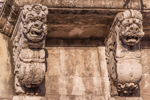 The detail of a baroque balcony in sicily