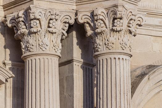 Detail of columns and capitals in an ancient Sicilian baroque church