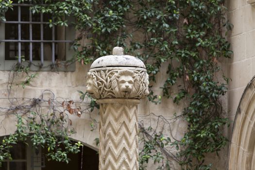 fountain with stone lions in old City Mdina, Malta, Europe.