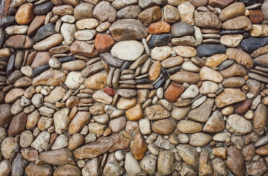 Sea stones pebble texture background .