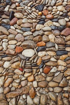 Sea stones pebble texture background .