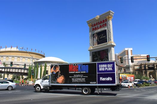 Caesars Palace Hotel and Casino on the Las Vegas Strip with local advertising.