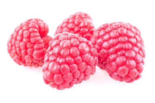 Fresh raspberries isolated on a white background