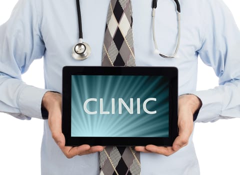 Doctor, isolated on white backgroun,  holding digital tablet - Clinic