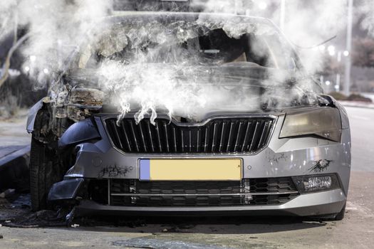 road and transport incident, a broken steaming car