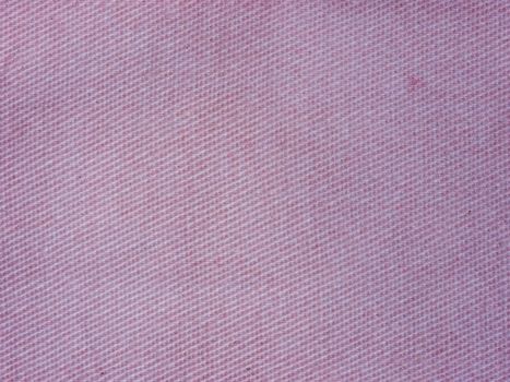 Natural purple cotton fabric weaving close up as background texture