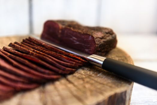 pastrami knife on a wooden table