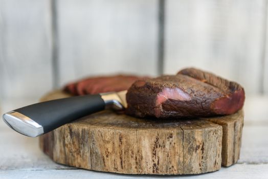pastrami knife on a wooden table