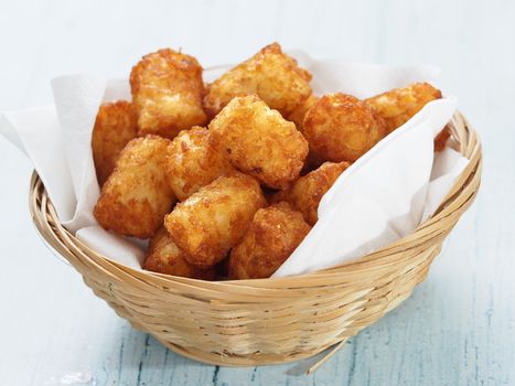 close up of rustic golden potato tater tots