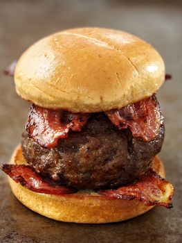 close up of rustic carnivore meat lover hamburger