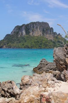 View from stone coast to island and sea, Thailand
