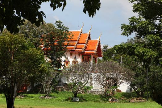 beautiful Buddhist temple gable, in forest of Thailand