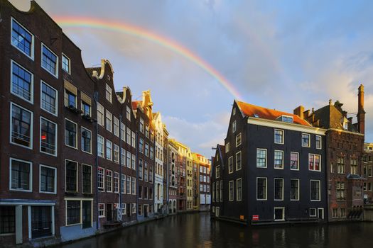 Amsterdam canal with rainbow, Netherlands