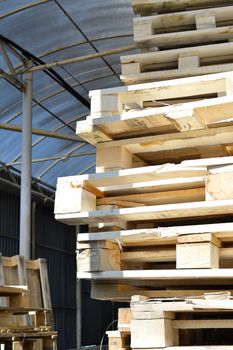 Waste wood from pallets stacked in the storage room.