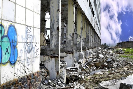 Pieces of Metal and Stone are Crumbling from Demolished Building Floors