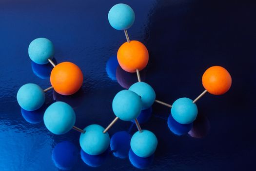 Science Molecule. Chemistry DNA molecule lab test on blue background