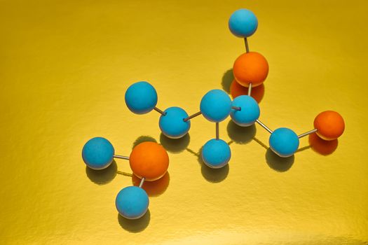 Science Molecule. Chemistry DNA molecule lab test on yellow background