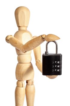 Wooden puppet holds small padlock on white background