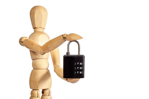 Wooden puppet holds small padlock on white background
