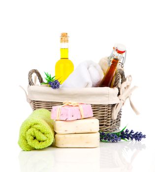 handmade lavender soap, and essential oil and fresh towel on white background. 
Beauty and health foundation