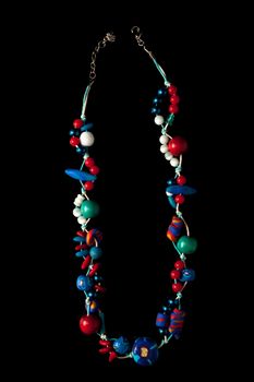 Jewelry of beads on black background
