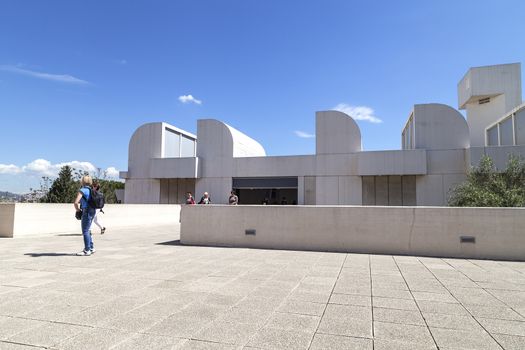 BARCELONA, SPAIN - MAY 12, 2016 :Tourists on the terrace of the building Joan Miro Foundation in a sunny day. Joan Miro Foundation, Centre of Studies of Contemporary Art  is a museum of modern art  located on the hill  Montjuïc .It was founded in 1968.
