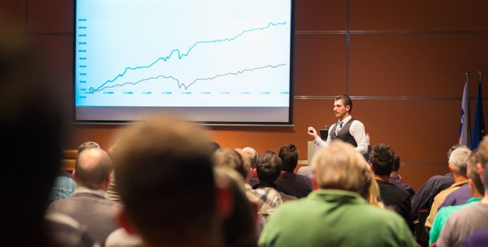 Speaker at Business Conference and Presentation. Audience at the conference hall. Business and Entrepreneurship.