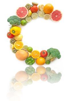 C shape letter made from fruits and vegetables high in vitamin C