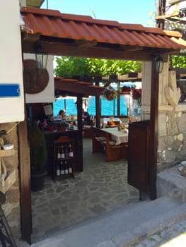 Entrance to the outdoor cafe by the sea