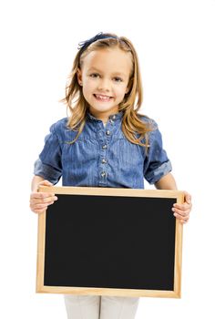 Cute little girl holding a chalkboard, isolated on white