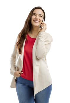 Beautiful woman talking on the phone, isolated over white background