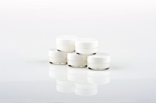 Blank white facial cream jar isolate on white background