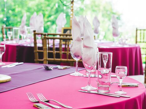 Beautiful dinner wedding table setting, summer outdoor