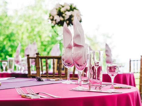 Beautiful dinner wedding table setting, summer outdoor