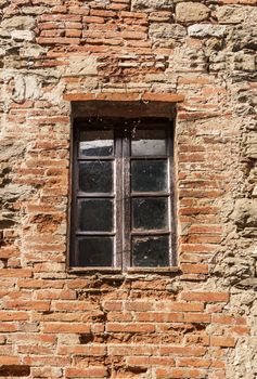 Window on the Facade of Italian stone wall