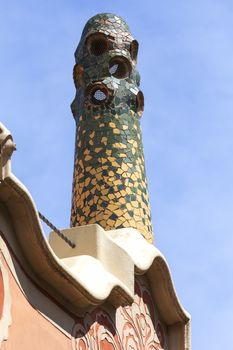 BARCELONA , SPAIN - MAY 13, 2016 : Decorative facade  on Gaudi House Museum with mosaic chimney . Building  located near the Park Guell  in Barcelona was the residence of Antoni Gaudi for almost 20 years, from 1906 to 1925.
