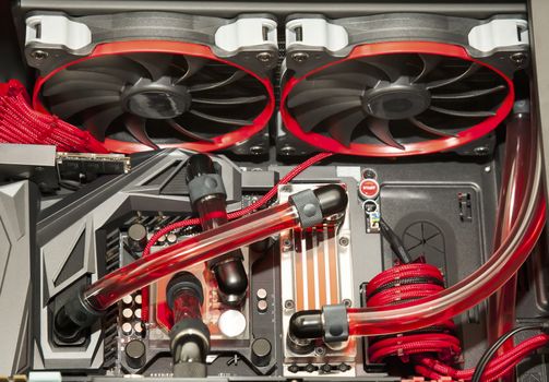 Inside computer water cooling  system in red background