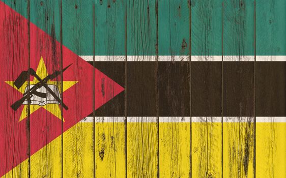 Flag of Mozambique painted on wooden frame