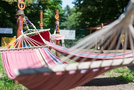 hammock hanging in the green garden