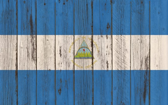 Flag of Nicaragua painted on wooden frame