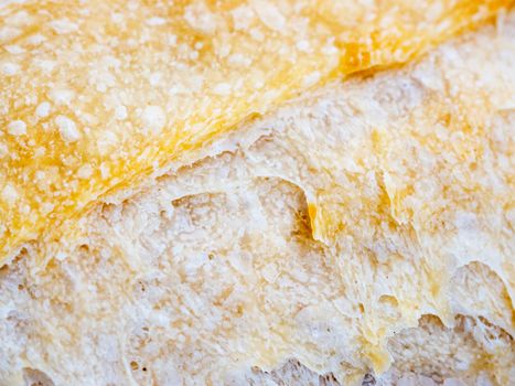 Macro of sourdough bread crust texture. Tasty fresh sourdough bread, close up for background