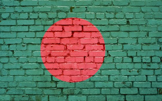 Flag of Bangladesh painted on brick wall, background texture