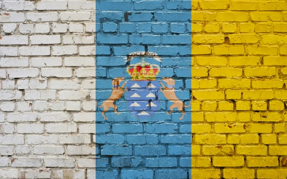 flag of Canary Islands painted on brick wall