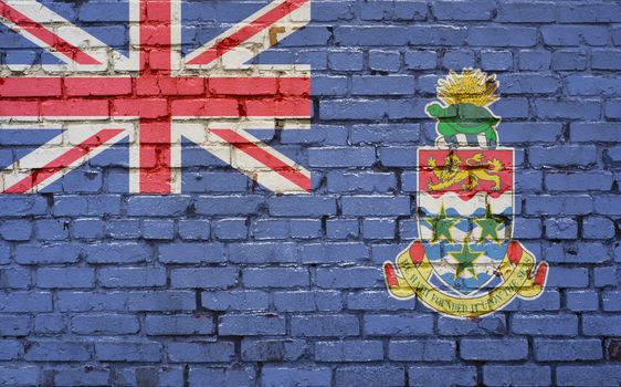 flag of Cayman Islands painted on brick wall